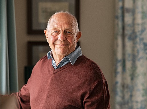 Closeup of senior man smiling at home