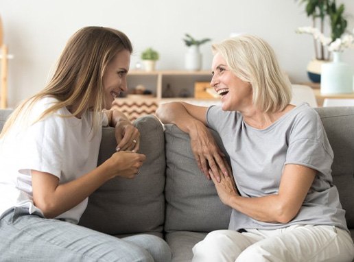 Ladies converse on couch