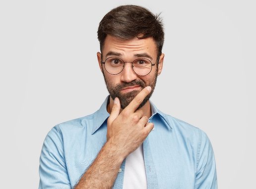 Man wondering about dental checkups and cleanings in Rocky Mount 