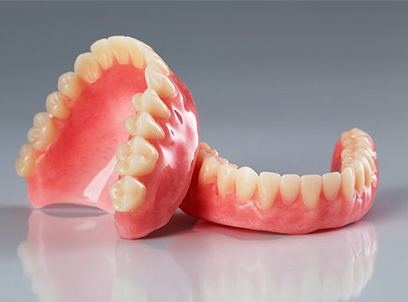 Full set of upper and lower dentures