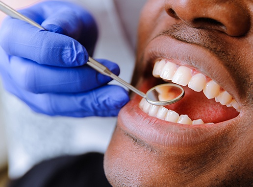 Man receiving gum disease treatment