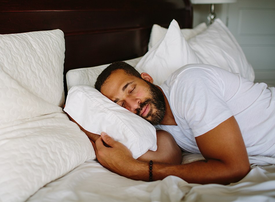 Man sleeping soundly thanks to sleep apnea therapy