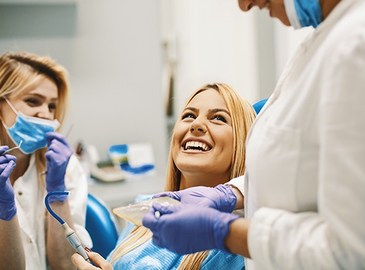 Dentist and patient reviewing the smile makeover process