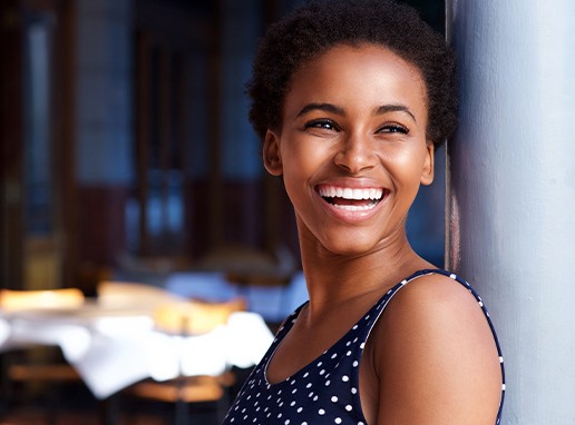 Woman sharing gorgeous smile after makeover