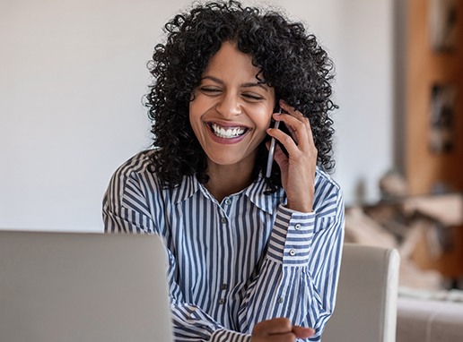 Woman calling to schedule a T M J therapy assessment