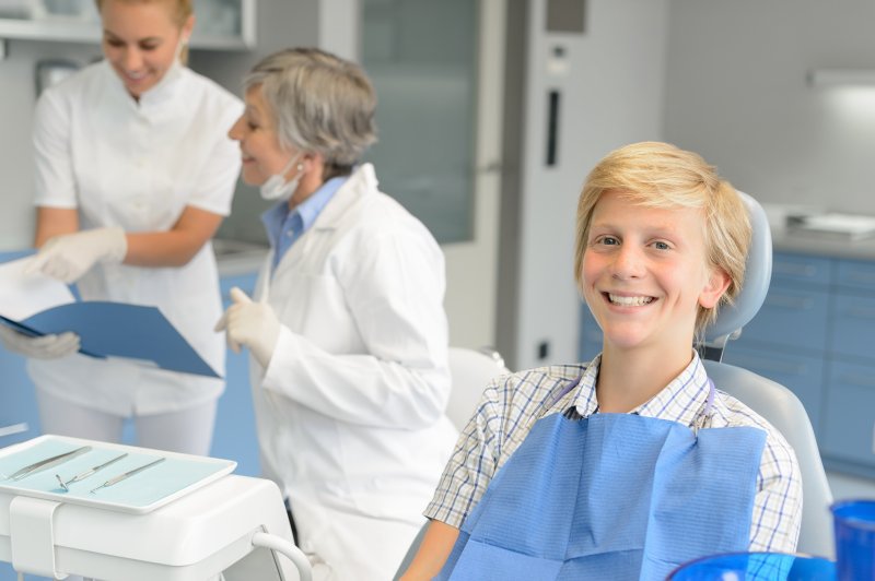 Teenager talking to a dentist